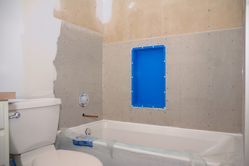 bathroom remodeling contractors to place bathroom tile