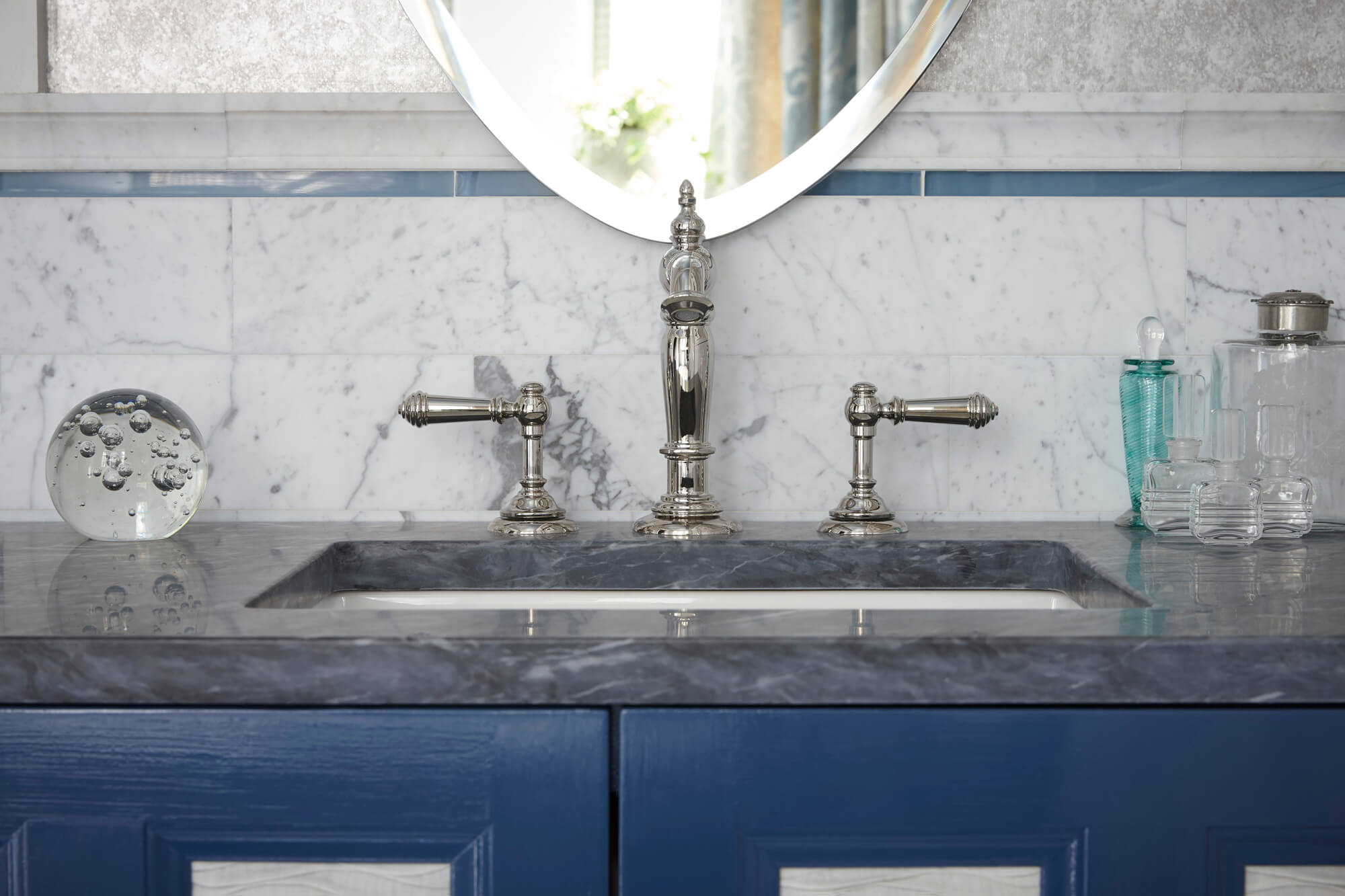 gray marble vanity countertop with silver faucet