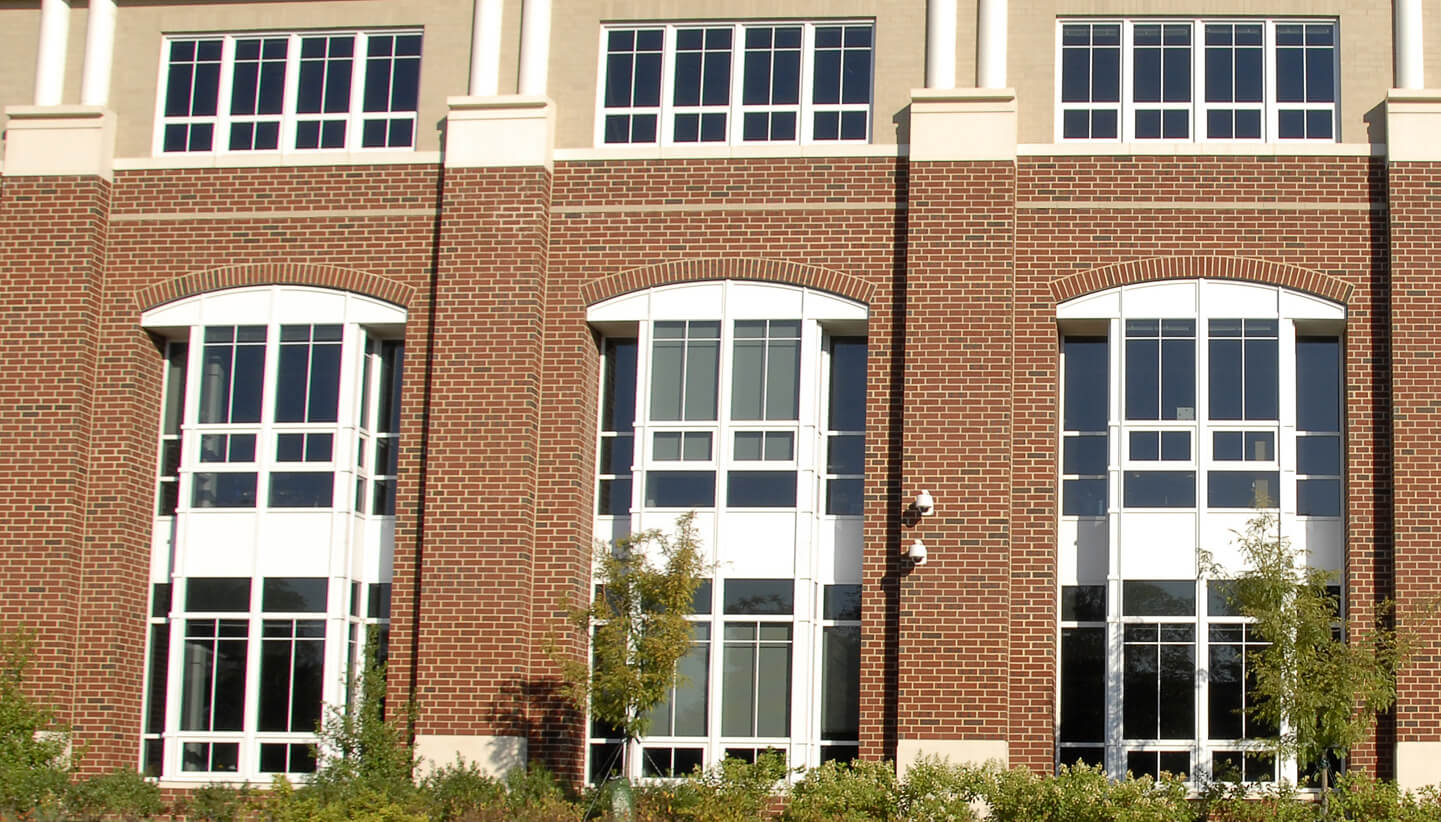 commercial aluminum and glass windows on brick building